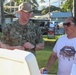 Force Master Chief Jason Dunn, the senior enlisted leader for Commander, Navy Installations Command, speaks with Hawaii residents about the Navy’s Drinking Water Long-Term Monitoring program