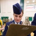 Alaska Air National Guardsman volunteers as JROTC drill judge