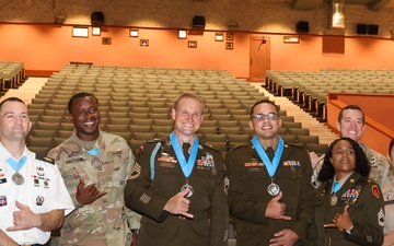 “Do hard things, your Soldiers are watching:” Two Tropic Lightning NCOs inducted into Sergeant Audie Murphy Club