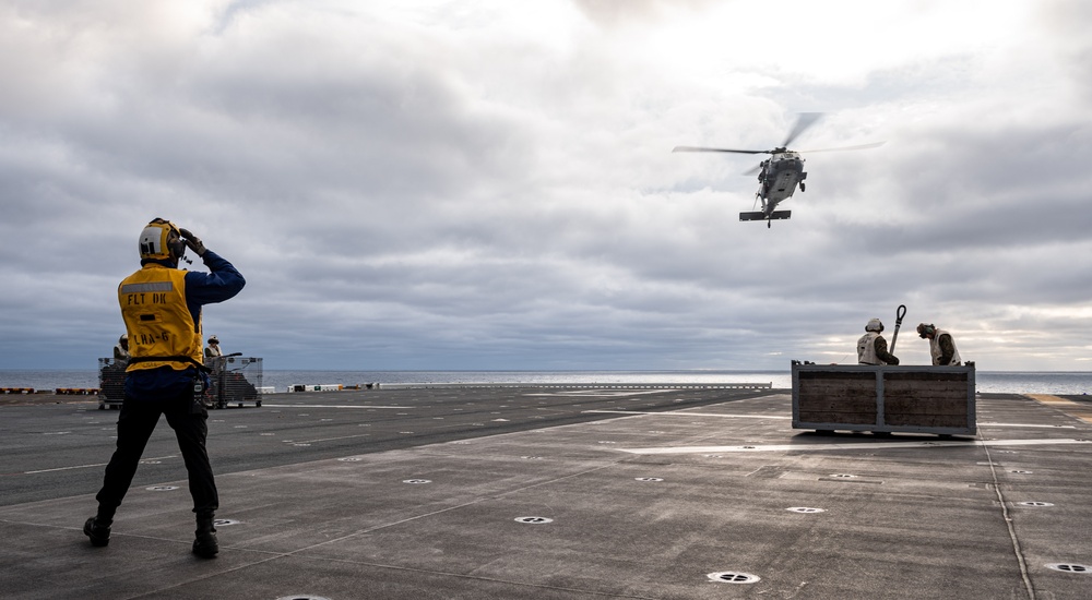 USS America Conducts (LHA 6) a Vertical Replenishment With USNS Carl Brashear (T-AKE-7)