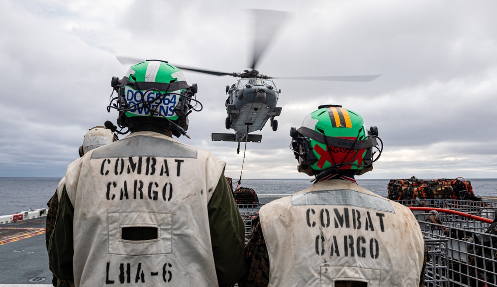 USS America Conducts (LHA 6) a Vertical Replenishment With USNS Carl Brashear (T-AKE-7)