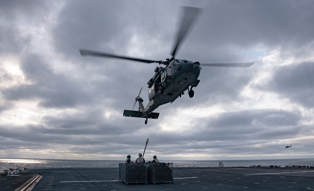 USS America Conducts (LHA 6) a Vertical Replenishment With USNS Carl Brashear (T-AKE-7)