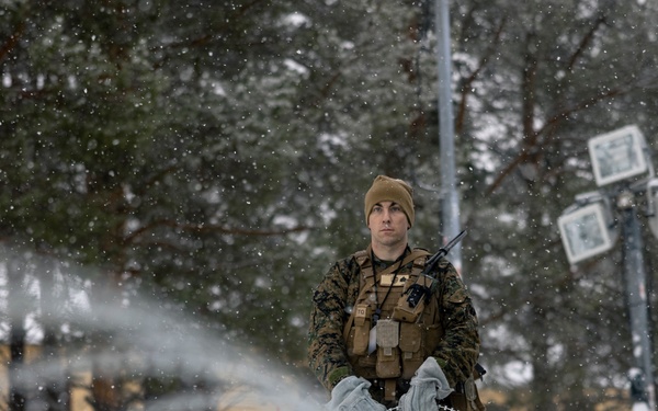 U.S. Marines with 2nd Marine Aircraft Wing set up concertina wire in preparation for Exercise Nordic Response 24