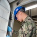 USS Ronald Reagan (CVN 76) Sailors conduct door maintenance