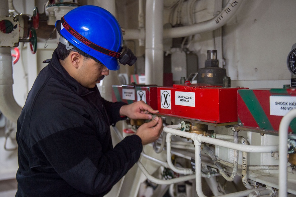 USS Ronald Reagan (CVN 76) Sailors troubleshoot an AFFF station