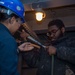 USS Ronald Reagan (CVN 76) Sailors prepare corrosion control tools