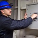 USS Ronald Reagan (CVN 76) Sailors troubleshoot an AFFF station