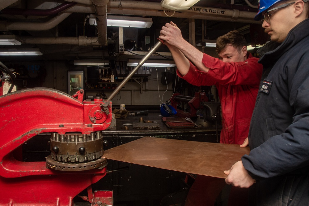 USS Ronald Reagan (CVN 76) Sailors create repair parts