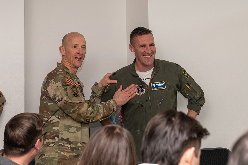 Brig. Gen. Rodger &quot;Dan&quot; Waters introduces Lt. Col. Matthew Schwegel during a congressional staff representative visit