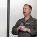 Maj. Kyle Zust addresses congressional staff representatives during their visit to Nevada Air National Guard Base