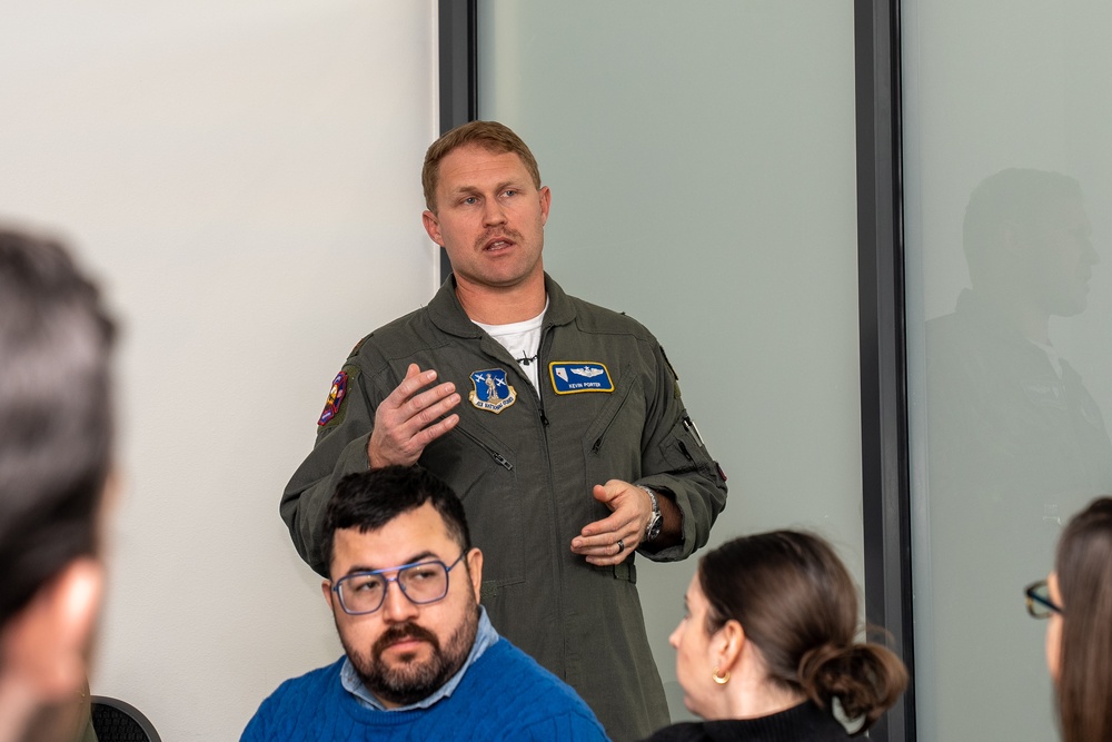 Maj. Kevin Porter addresses congressional staff representatives during their visit to Nevada Air National Guard Base