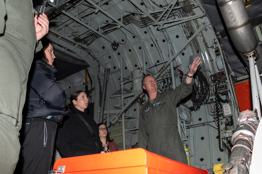 Maj. Kyle Zust discusses MAFFS with congressional staff representatives during their visit to Nevada Air National Guard Base