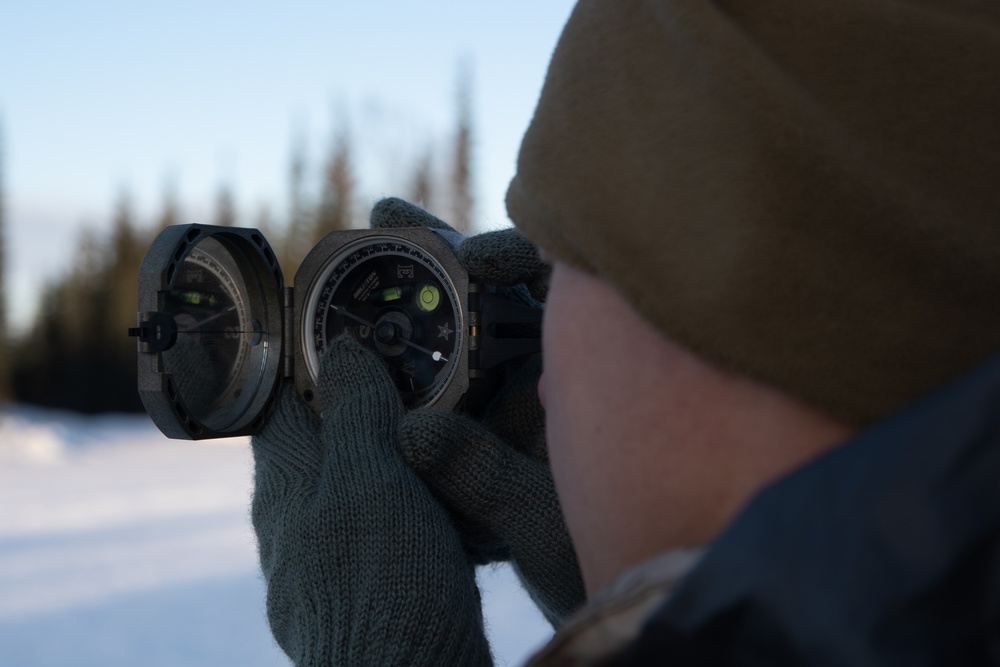 ARCTIC EDGE 24: Fox 2/14 Marines shoot azimuth for HIMARS firing