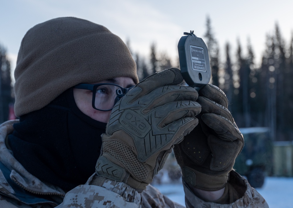 ARCTIC EDGE 24: Fox 2/14 Marines shoot azimuth for HIMARS firing