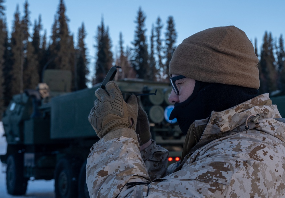 ARCTIC EDGE 24: Fox 2/14 Marines shoot azimuth for HIMARS firing