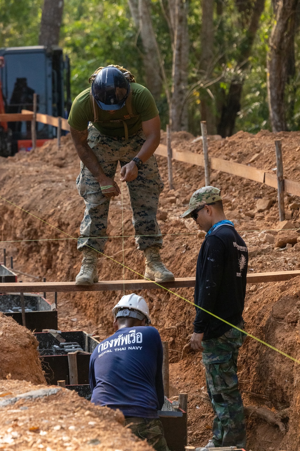 Strong Relationships and Strong Foundations: Marines with MWSS-171 begin building the Ban Prakaet School at Chanthaburi, Thailand