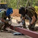 Strong Relationships and Strong Foundations: Marines with MWSS-171 begin building the Ban Prakaet School at Chanthaburi, Thailand