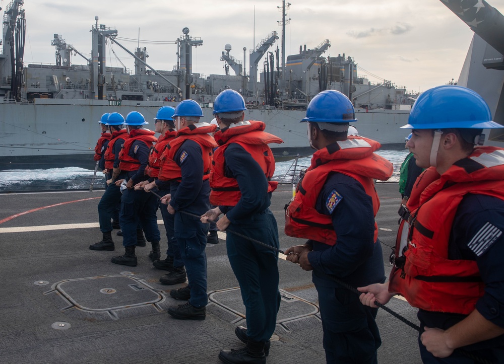 USS Gravely Conducts a Replenishment-at-Sea with USNS Supply in the Red Sea