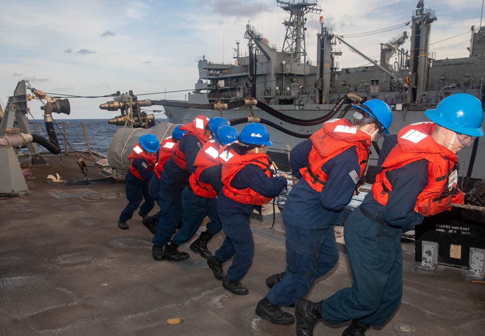 USS Gravely Conducts a Replenishment-at-Sea with USNS Supply in the Red Sea