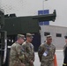 U.S. Army Maj. Gen. Michael Leeney, commanding general of Task Force Spartan, greets a (HIMARS) cre