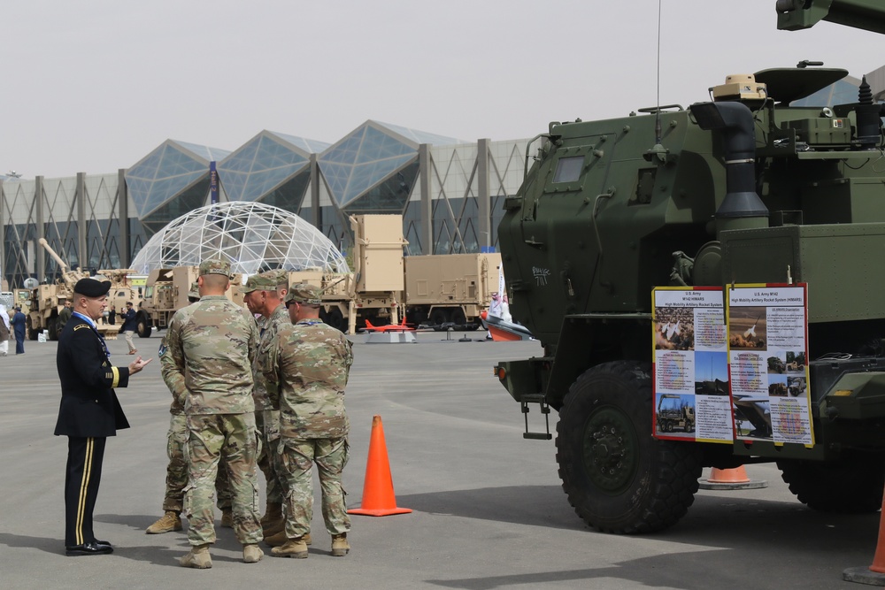 U.S. Army Maj. Gen. Michael Leeney, commanding general of Task Force Spartan, greets a HIMARS crew