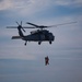 USS San Diego and Helicopter Sea Combat Squadron 23 recover mock astronaut while underway for NASA’s Underway Recovery Test 11