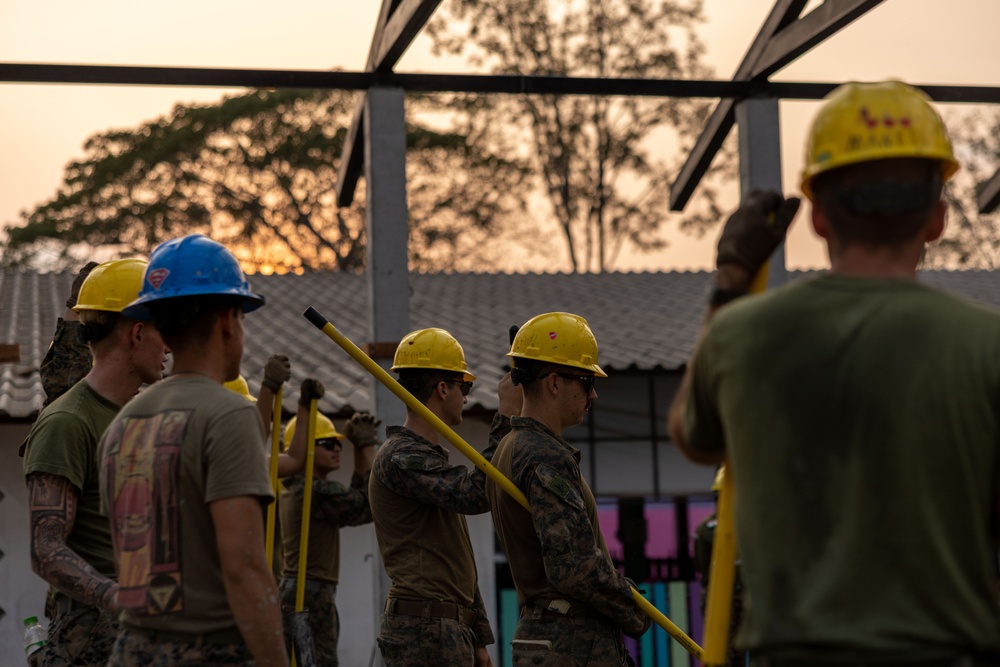 Cobra Gold 24; Marines with Marine Wing Support Squadron 174 pour a concrete pad for the Bankhaocha-Angkromklong School