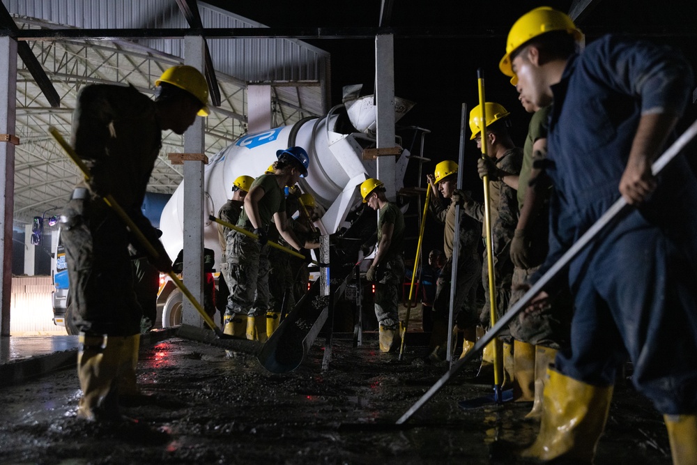 Cobra Gold 24; Marines with Marine Wing Support Squadron 174 pour a concrete pad for the Bankhaocha-Angkromklong School