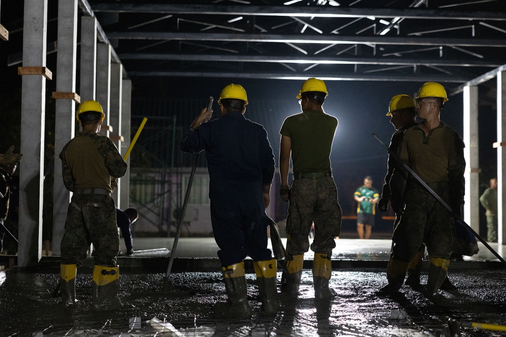 Cobra Gold 24; Marines with Marine Wing Support Squadron 174 pour a concrete pad for the Bankhaocha-Angkromklong School