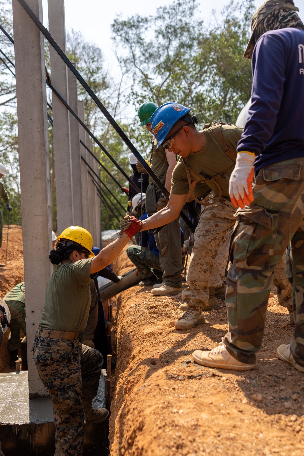 Exercise Cobra Gold 2024; U.S. Marines Fill Foundation Footers with Concrete