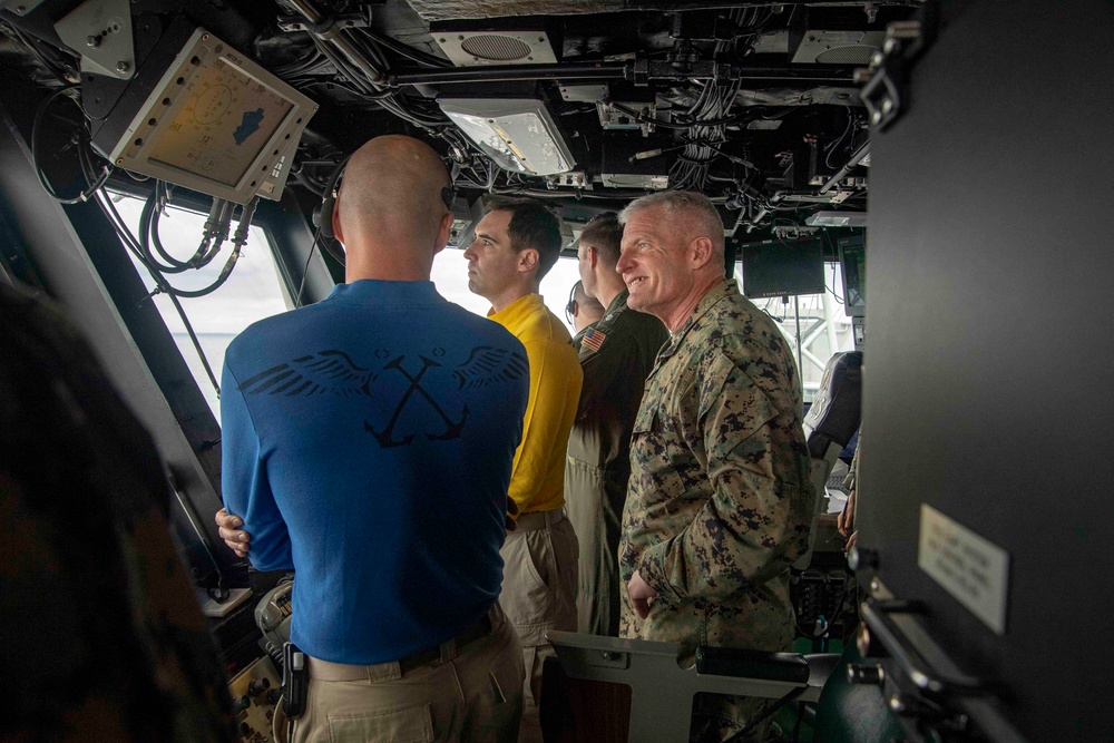 Lt. Gen. Roger Turner, commanding general of III Marine Expeditionary Force visits the USS America