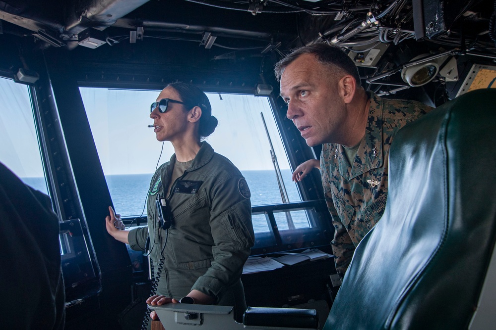 Maj. Gen. Eric E. Austin, commanding general of 1st Marine Aircraft Wing visits Primary Flight Control of the USS America (LHA 6)