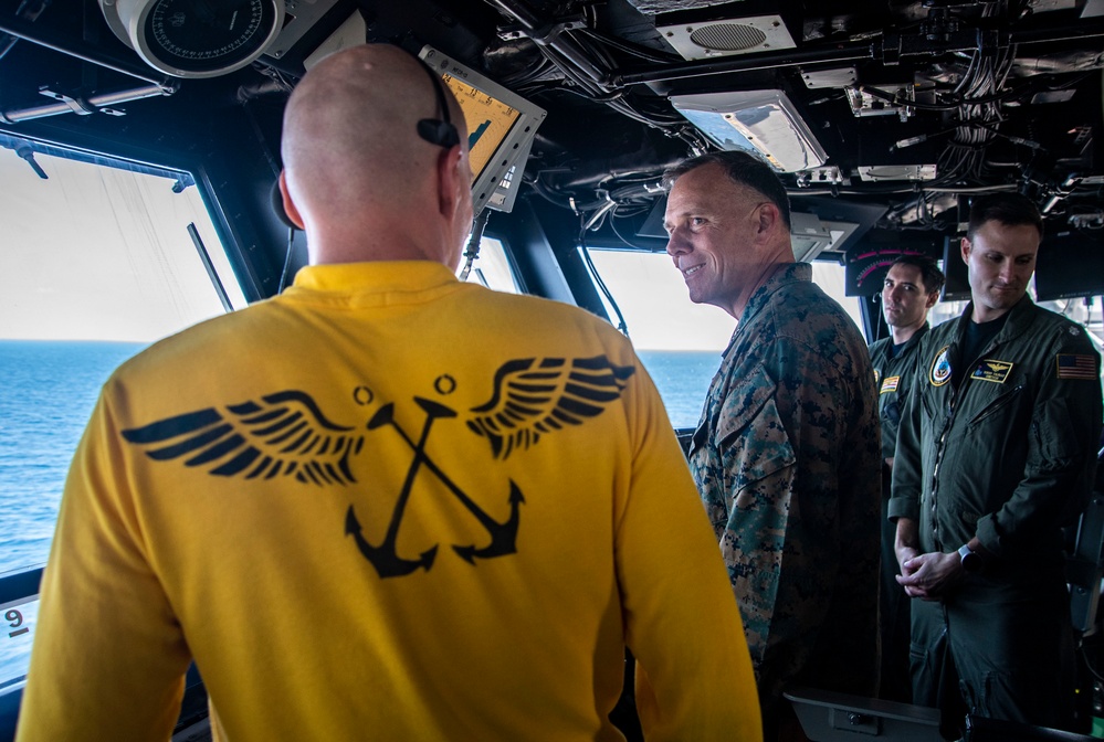 Maj. Gen. Eric E. Austin, commanding general of 1st Marine Aircraft Wing visits Primary Flight Control of the USS America (LHA 6)