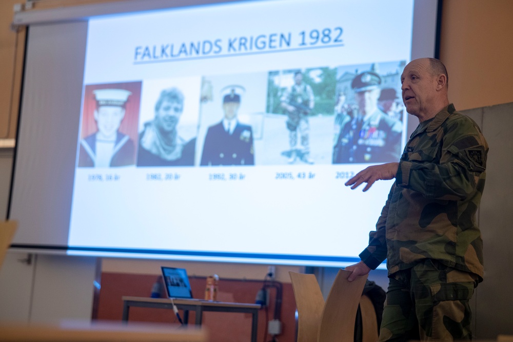 Norwegian Maj. Kevin Watton speaks with II MEF Marines about his military background