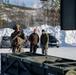 U.S. Marines demonstrate an M142 High Mobility Artillery Rocket System to Norwegian Army leaders