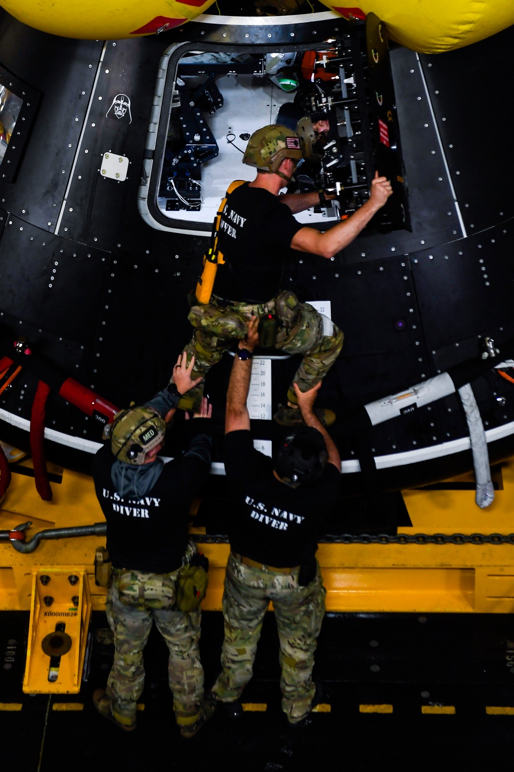 USS San Diego and Navy Divers practice with CMTA during NASA’s Underway Recovery Test 11