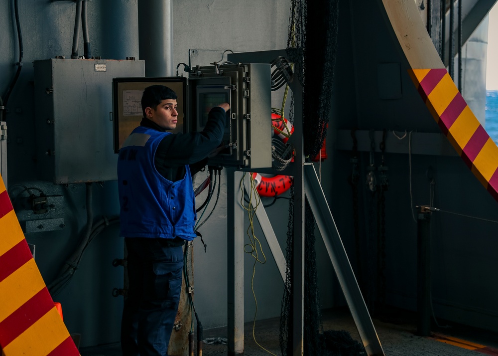 Sailors Conduct Maintenance on Aircraft Elevator