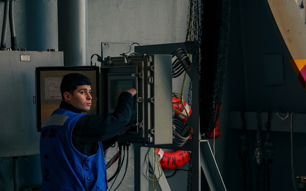Sailors Conduct Maintenance on Aircraft Elevator