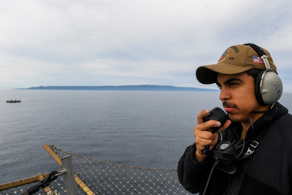 USS San Diego Sailor stands watch underway during NASA’s Underway Recovery Test 11