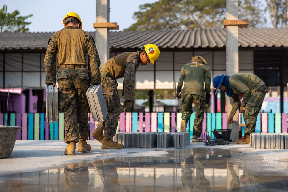 Cobra Gold 24; Marines With Marine Wing Support Squadron 174 lay bricks at the Bankhaocha-Angkromklong School