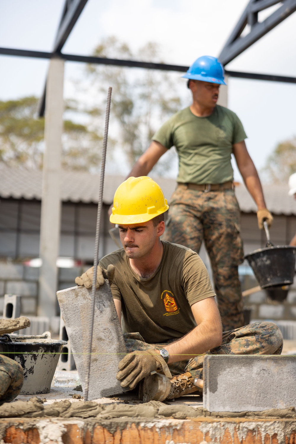 Cobra Gold 24; Marines With Marine Wing Support Squadron 174 lay bricks at the Bankhaocha-Angkromklong School