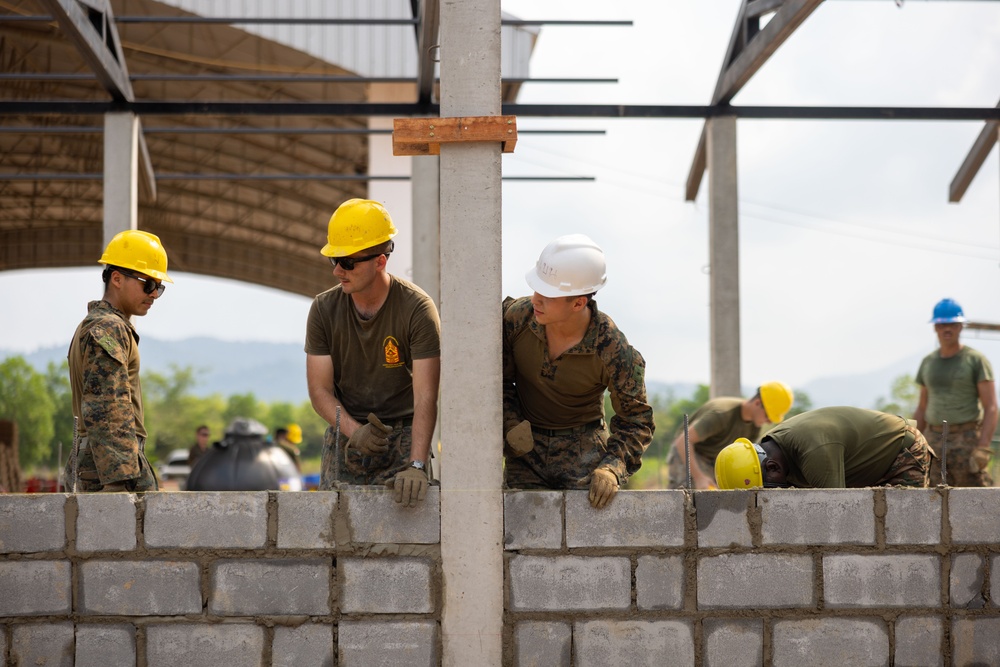 Cobra Gold 24; Marines With Marine Wing Support Squadron 174 lay bricks at the Bankhaocha-Angkromklong School