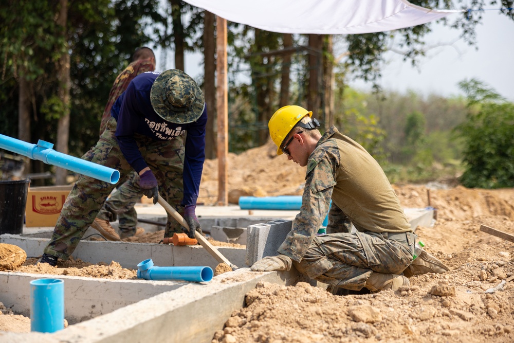 Cobra Gold 24; Marines With Marine Wing Support Squadron 174 lay bricks at the Bankhaocha-Angkromklong School