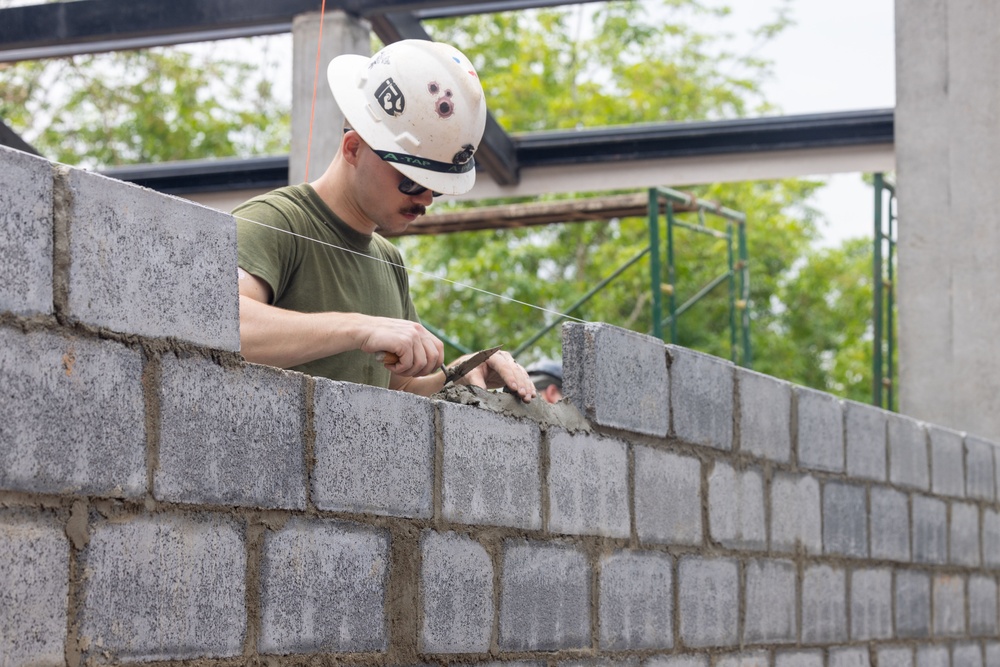 Cobra Gold 24; Marines with Marine Wing Support Squadron 171 lay bricks at the Ban Prakaet School