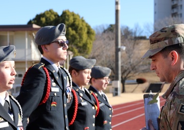 Camp Zama JROTC cadets demonstrate attention to detail during in-ranks inspection