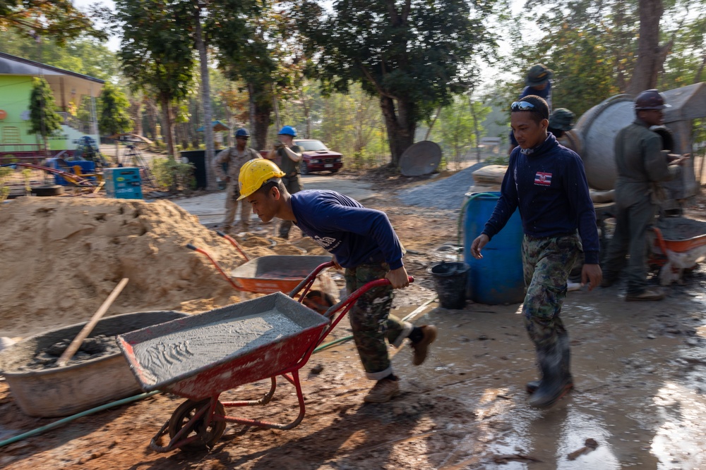 Cobra Gold 24; Marines with Marine Wing Support Squadron 171 apply stucco at the Ban Prakaet School