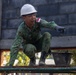 Cobra Gold 24; Marines with Marine Wing Support Squadron 171 apply stucco at the Ban Prakaet School