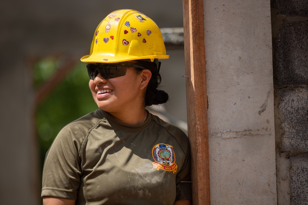 Cobra Gold 24; Marines with Marine Wing Support Squadron 171 apply stucco at the Ban Prakaet School