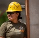 Cobra Gold 24; Marines with Marine Wing Support Squadron 171 apply stucco at the Ban Prakaet School