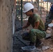 Cobra Gold 24; Marines with Marine Wing Support Squadron 171 apply stucco at the Ban Prakaet School